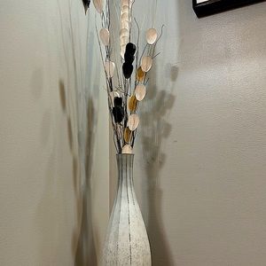 Super elegant white vase with contemporary flowers